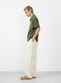 Field Pant in Bone from Stüssy at Couverture & The Garbstore 
Model side 