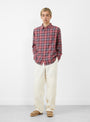  Beach Plaid Shirt in Red from Stüssy at Couverture & The Garbstore 
Model Front 