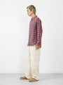  Beach Plaid Shirt in Red from Stüssy at Couverture & The Garbstore 
Model Side 