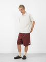 The Heavy Jersey shorts in wine  from Stüssy at Couverture & The Garbstore 
Model side 