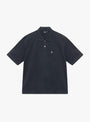 Classic Pique Polo in Black by Stüssy at Couverture & The Garbstore 
Front 