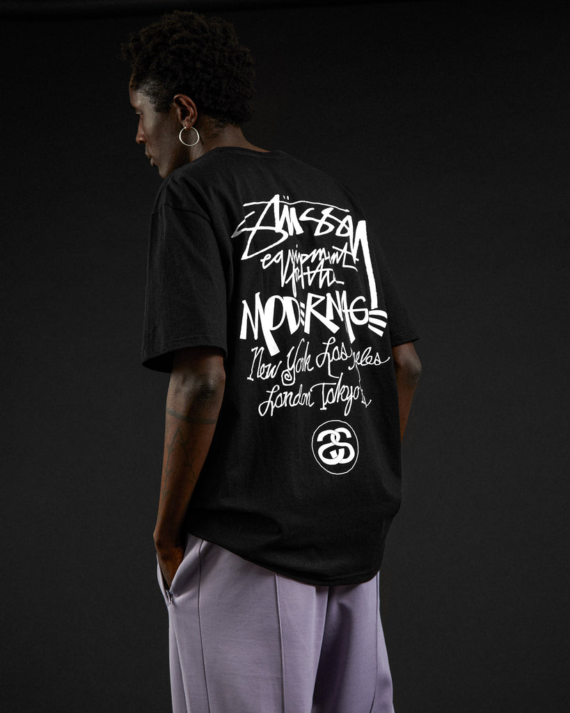 Stüssy T-shirt and sweatpants styled by Garbstore