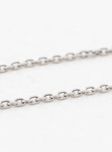 10 Cent Brace Point Smilie Pendant Necklace Silver by NORTH WORKS | Couverture & The Garbstore