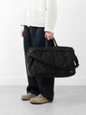 TANKER 2way duffle bag black on model 