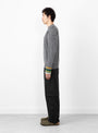 Border Knit Pullover Grey by TOGA VIRILIS at Couverture and The Garbstore on model side profile