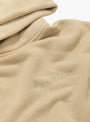 Wordmark Pigment Dyed Hoodie Taupe by Museum of Peace and Quiet at Couverture and The Garbstore close up 
