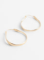 Irregular Brass Hoop Earrings Gold Plated from Helena Rohner at Couverture & The Garbstore
Close-up