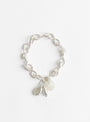 Baba Charm Bracelet in Silver by Lizzie Ames at Couverture & The Garbstore
Front View