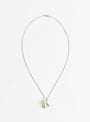 Baba Charm Necklace Clear by Lizzie Ames at Couverture & The Garbstore
Front View