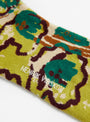 Playground Flowers Socks Brown Green Spraycan by Henrik Vibskov at Couverture & The Garbstore
Close-up