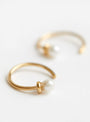 Pearl Hoop Earrings Gold by Beatriz Palacios at Couverture & The Garbstore
Close-up