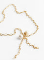 Gold Chain with Pearl Ball Piercing Necklace by Beatriz Palacios at Couverture & The Garbstore
Close-up