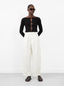 Bari Crop Trouser in Cream from Apiece Apart at Couverture & The Garbstore model front 