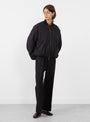 Jenai Bomber Jacket from Christian Wijnants in Black from Couverture & The Garbstore, model front 