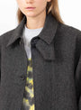 The Tyrell Wool Trench Coat in Grey Melange from YMC at Couverture & The Garbstore
Model Detail