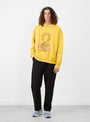 x Peanuts Pig Pen Friends Sweatshirt Mustard from Vintage Heavy at Couverture & The Garbstore
model front 