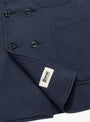The Milk Jacket in Navy from TDR at Couverture & The Garbstore
label