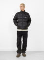 The Midweight Puffer from Stüssy in Black at Couverture & The garbstore Model Front 