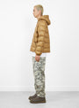 The Midweight Hooded Puffer from Stüssy in Khaki at Couverture & The Garbstore Model Side