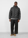 Base LT Down Hooded Jacket Charcoal Black from Hiking Patrol at Couverture & The Garbstore
model front 