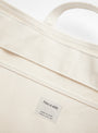 The Base Tote (XL) from This is (an) in White at Couverture & The Garbstore
label