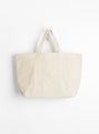 The Base Field Tote (L) from This is (an) arrives in White at Couverture & The Garbstore
back