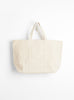 The Base Field Tote (L) from This is (an) arrives in White at Couverture & The Garbstore
front 