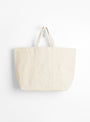 The Base Field Tote (XL) from This is (an) in White at Couverture & The Garbstore
front 
