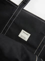 The Base Field Tote (XL) from This is (an) in Black and Black at Couverture & The Garbstore 
label