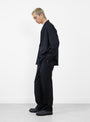 Shoecut Slacks in Navy by Kaptain Sunshine at Couverture and The Garbstore 
model side 
