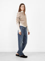 Knot Shoulder Knitted Poncho Husk by Lauren Manoogian at Couverture & The Garbstore 
model side