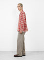 The Fever Shirt arrives from Post O'Alls in Red Ombre Plaid Flannel at Couverture & The Garbstore
model side 