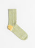 The 56 Yarns Rib RAINBOW HAPPY Heel Socks come in Green from Kapital at Couverture & The Garbstore
front 
