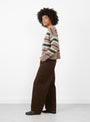 The Cannes Jumper from Skall Studio comes in light brown, green and wine stripe at Couverture & The Garbstore
model side