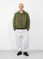 The Pile Lined Zip Jacket from Stüssy arrives in Olive at Couverture & The Garbstore
model front 