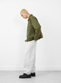 The Pile Lined Zip Jacket from Stüssy arrives in Olive at Couverture & The Garbstore
model side 
