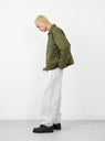 The Pile Lined Zip Jacket from Stüssy arrives in Olive at Couverture & The Garbstore
model side 