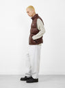 The Micro Ripstop Down Vest from Stüssy arrives in Brown at Couverture & The Garbstore
model side 