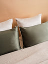 The Mulberry Silk Pillowcase from Emily's Pillow comes in Sage Green at Couverture & The Garbstore
bedding