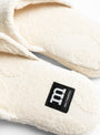 The Mini Unikko Slippers from Marimekko at Couverture & The Garbstore
label