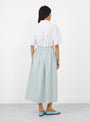 The Dagny Skirt comes in White and Aqua Stripe from Skall Studio
model back