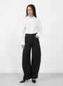 The Soline Wool Trousers in Black by Sefr from Couverture and the Garbstore 
model front
