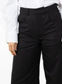 The Soline Wool Trousers in Black by Sefr from Couverture and the Garbstore 
model details