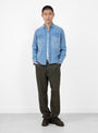 The Denim Pearlsnap Shirt from Wythe comes in Washed Indigo at Couverture & The Garbstore
model front 