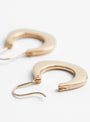 The Flat Wide Gold Plated Brass Hoops from Helena Rohner at Couverture & The Garbstore
detail