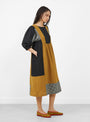 The Winnie Dress comes in Patchwork from Sideline at Couverture & The Garbstore
model side