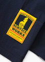 The Seersucker Server Suit Jacket comes in Dark Navy from Service Works at Couverture & The Garbstore
tag