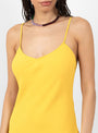 The Kasimira Bias Slip Dress comes in Goldenrod from Apiece Apart at Couverture & The Garbstore
model detail