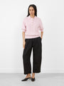 The Oda Polo Knit comes in Rosewater from Apiece Apart at Couverture & The Garbstore
model front