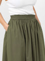 The Dagny Skirt in Khaki from Skall at Couverture and The Garbstore 
model detail